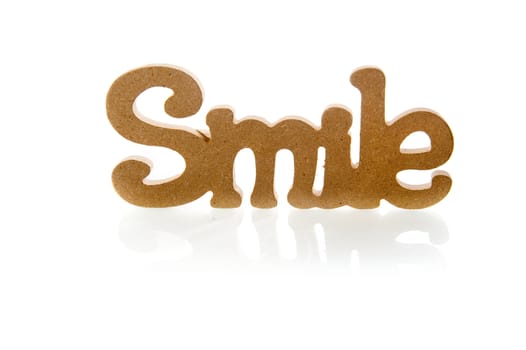 the word 'smile' made of wood