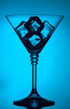 Ice cocktail on the blue background