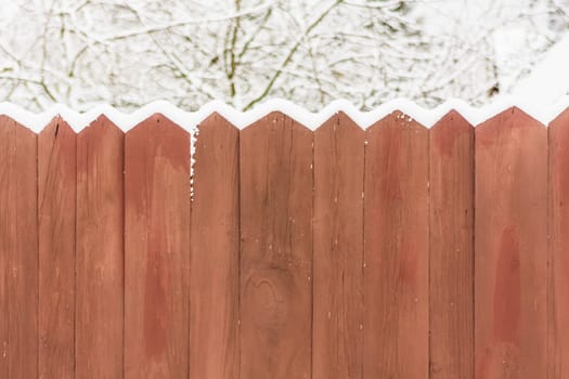 Old Wooden Fence In A Snow