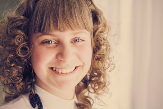 Portrait Of A Beautiful Young Woman Looking Happy