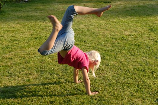 Handstand in the garden. Please note: No negative use allowed