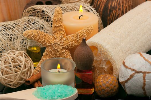 Spa scene with loofah and aromatic candles