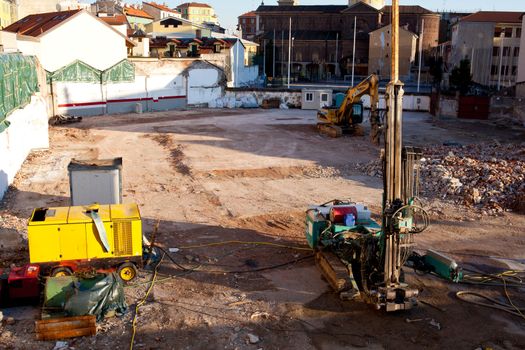 Excavator on a construction site in Milan