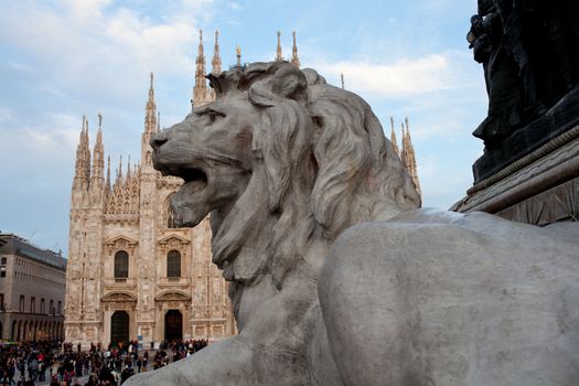 Lion statue of Vittorio Emanuele II monument in Piazza del Duomo Milan, Italy