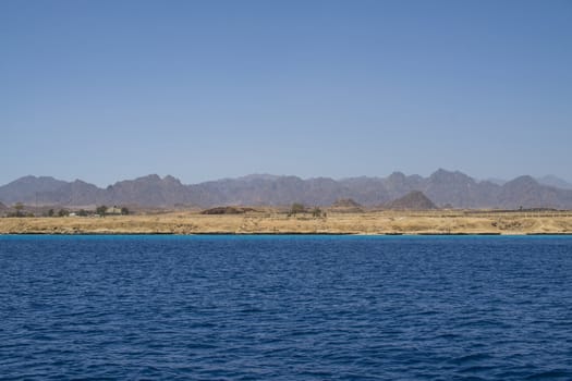 The picture is shot from a boat and towards land of the old town of Sharm el Sheikh, Egypt a day in April 2013.