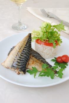 Baked mackerel with rice under vegetables