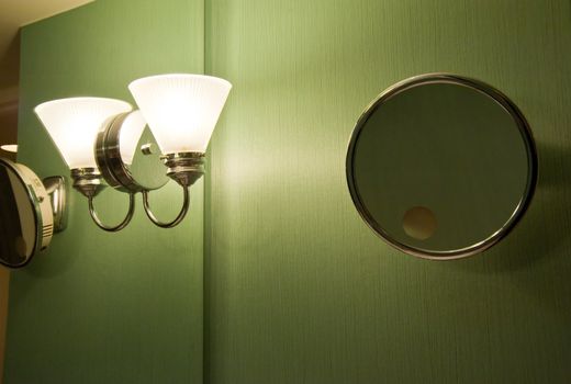 Light and shaving mirror in a bathroom