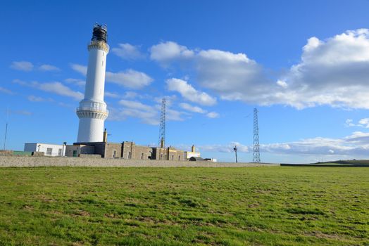 white lighthouse with blue sky in Aberdeen,Scotland, UK