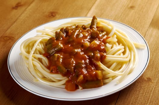  pasta with tomato  sauce  on wooden table