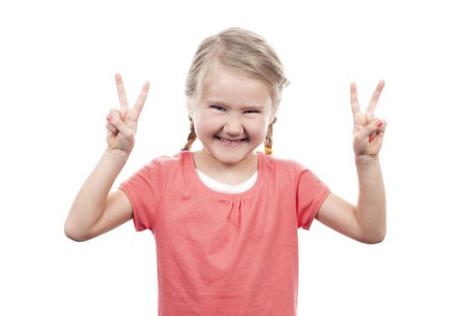 cute girl showing victory sign on white background