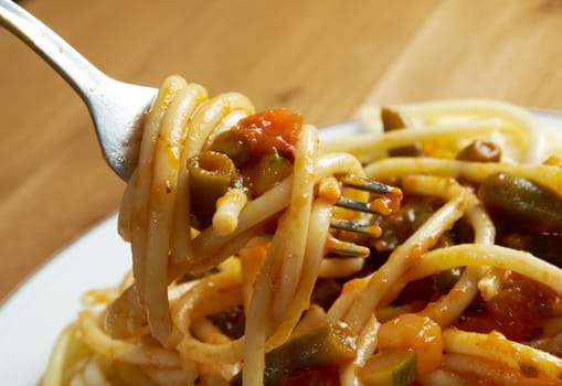  pasta with tomato  sauce  on wooden table