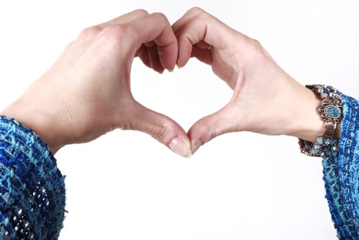 Woman making heart shape with her hands