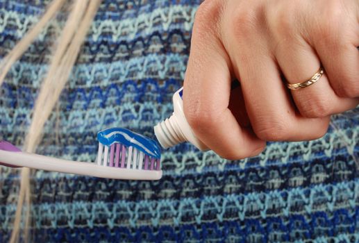 Woman brushing her teeth