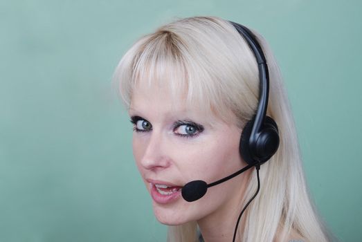 Portrait of young woman with headset