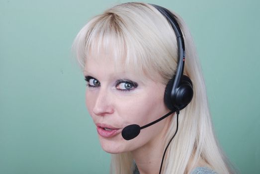 Portrait of young woman with headset