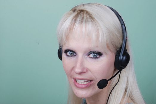 Portrait of young woman with headset