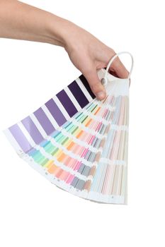 Hand holding a colour chart