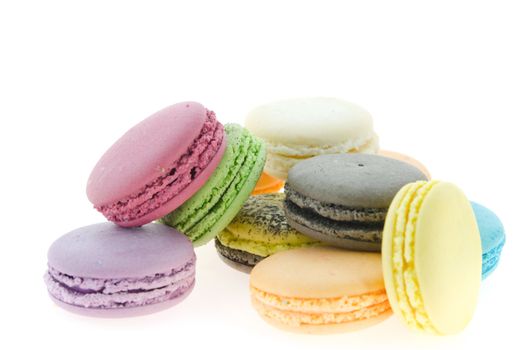 traditional colorful  french macaroons over white background