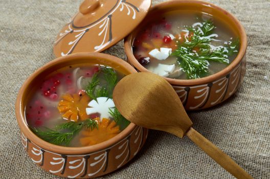 Aspic from meat decorated with egg, carrot,