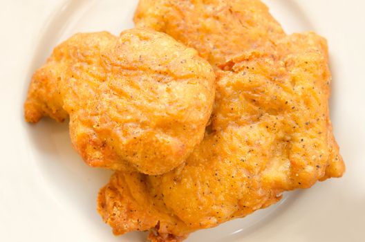 top views  fried Chicken nuggets on dish