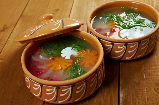 Aspic from meat decorated with egg, carrot,