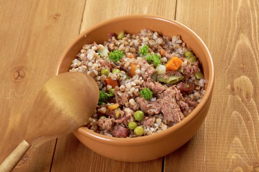 Russian Buckwheat porridge  vegetables und beef closeup