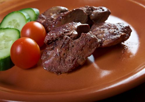 Chicken livers and vegetable.closeup