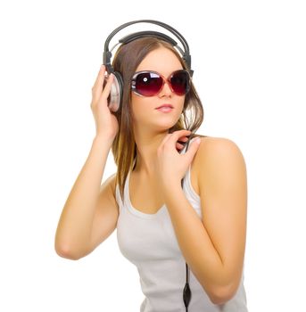 Young girl with headphones isolated