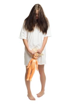 Zombie girl with plastic doll isolated