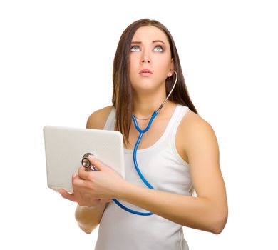 Young girl listening laptop by stethoscope isolated