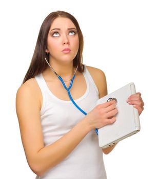 Young girl with laptop and stethoscope isolated