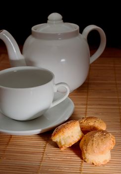 Tea and teapot on the bamboo napkin