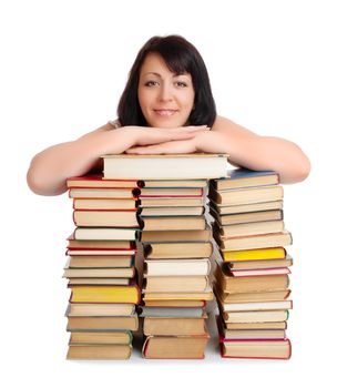 Young smiling woman with heap of books isolated
