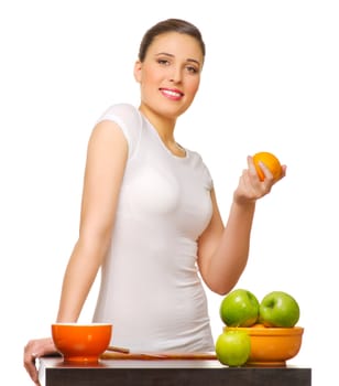 Young smiling girl with fruits isolated