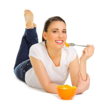 Young woman with fruit salad isolated