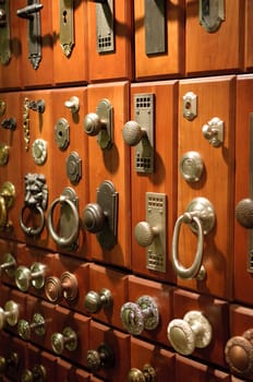 Assortment of metal doorknobs.