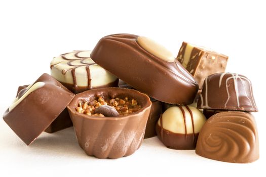 Chocolate candys and truffles on white background