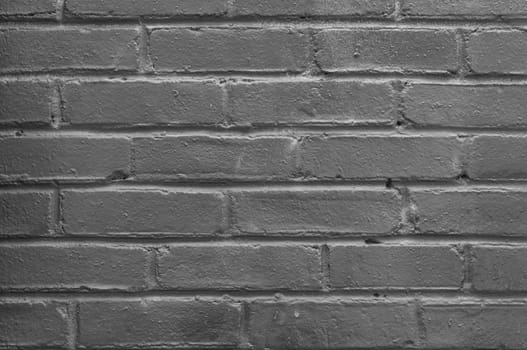 Old rough gray painted brick wall background