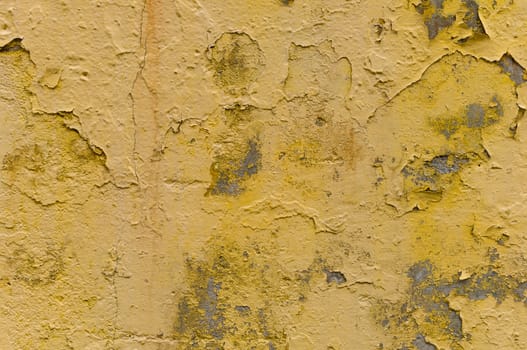 Yellow rough painted concrete wall background