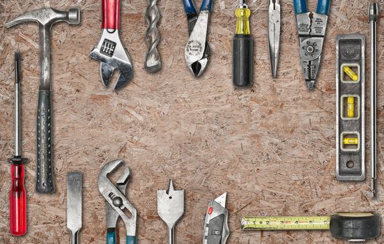 Group of used tools on wood with space