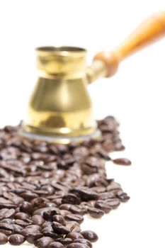 Fresh roasted coffee beans on a white background