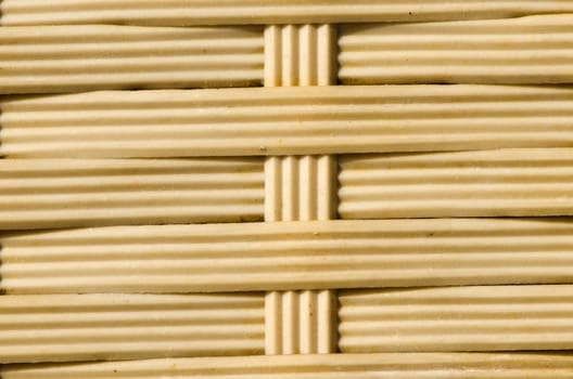 yellow rubber straps weaved basket background