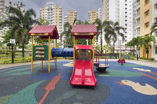 Rubber Ducky Theme Children Playground with Red Slides in Public Housing in Singapore Punggol District