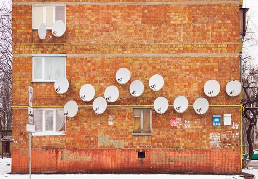 A lot of satellite dishes on the wall. 






 



















 
find similar images 


