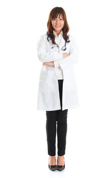 Nursing student standing isolated. Full body young Asian nurse or medical student standing isolated in full length wearing lab coat.