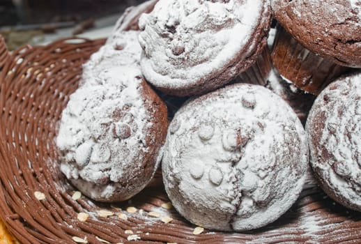Tasty muffin cakes with powdered sugar
