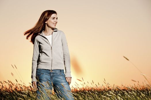 Outdoor portrait of a beautiful woman on a summer day