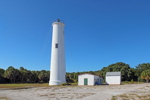 Lighthouse and associated buildings at the north end of Egmont Key, a small island near the mouth of Tampa Bay, Florida