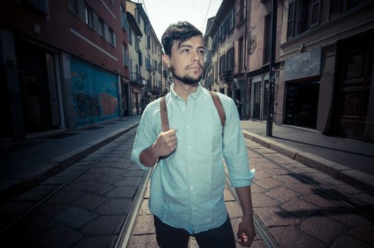 hipster young stylish man in the street