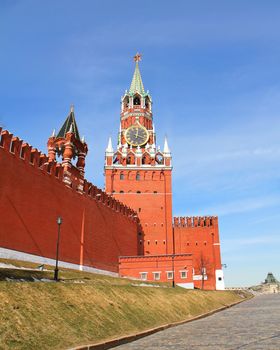 Moscow Kremlin. Spasskaya tower with a red star on a top of it and with a clock
